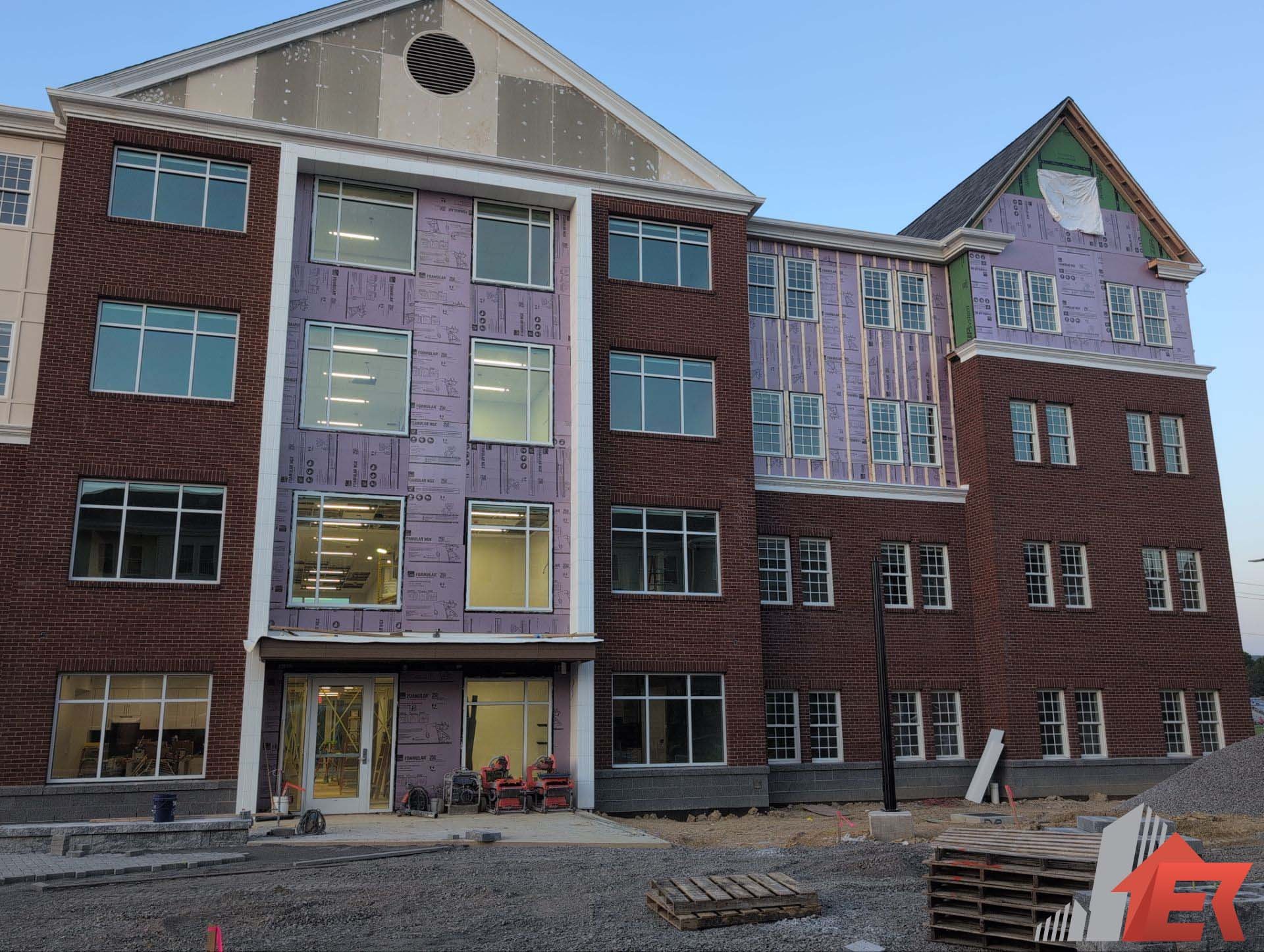 Cement siding in progress by Equity Commercial Roofing for Bucknell University in Lewisburg PA